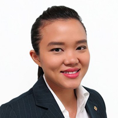 Image of Tara in suit smiling